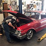 Senior Mechanic Ryan, installing after market cooling fan