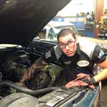 Senior technician, Kelly Schultz, diagnosing cooling system